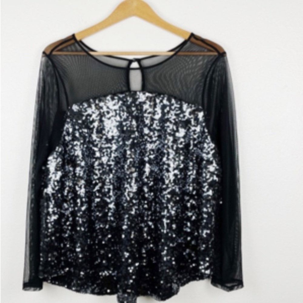 Size 0 plus Torrid glitter holiday shirt. Only worn once.